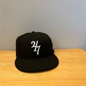 New Era Black Hat with White Embroidery